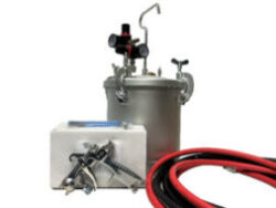 Spray gun and hose equipment with a pressure tank and hoses in red and black.